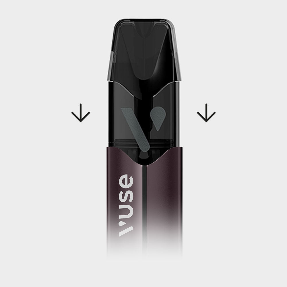 A Vuse vape pod partially inserted into a vape device, with two black arrows pointing down on each side, indicating the direction to insert the pod.