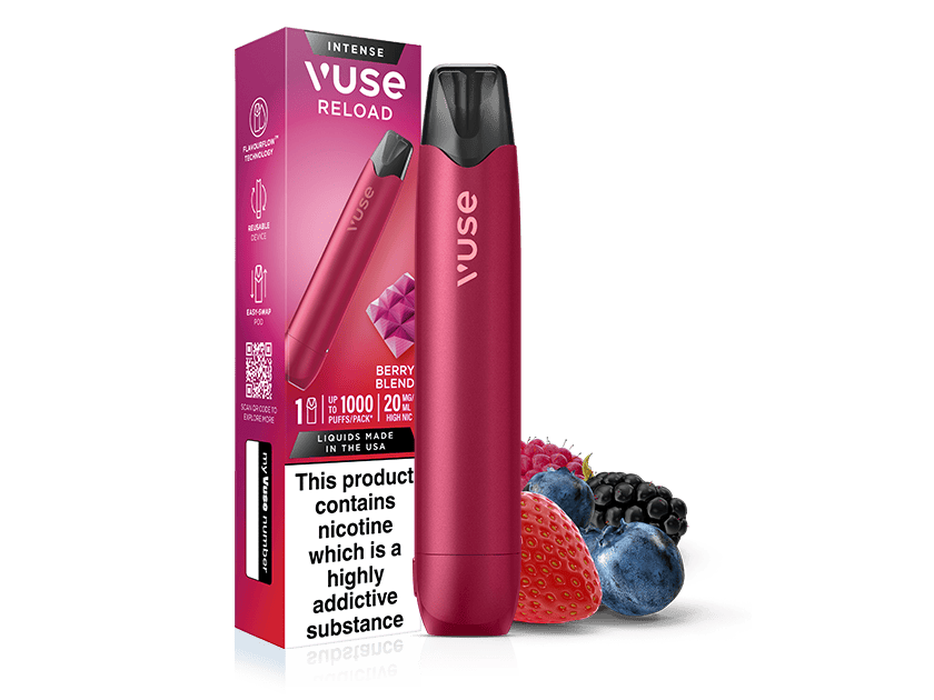A Berry Blend Vuse Reload Pen stands beside its box, which features berry graphics, flavor info, and a nicotine warning. Fresh strawberries, blueberries, and blackberries sit next to this sleek reusable Vuse vape device and its packaging.