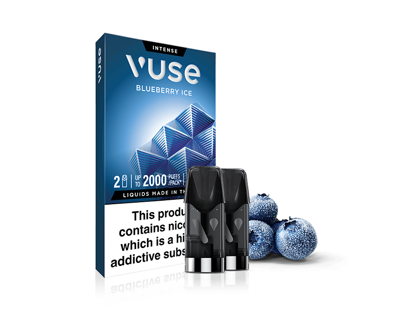 Vuse Blueberry Ice vape pod pack with two black pods in front, accompanied by frosted blueberries. The packaging displays icy blue cubes and product information, with a nicotine warning label at the bottom.