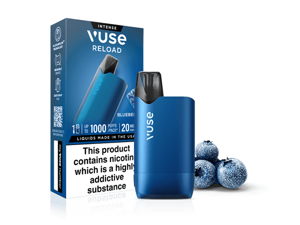 A Blueberry Ice Vuse Reload Box stands next to its packaging, showing product details and warnings. Three frosty blueberries by the device emphasize the cool Blueberry Ice flavor.