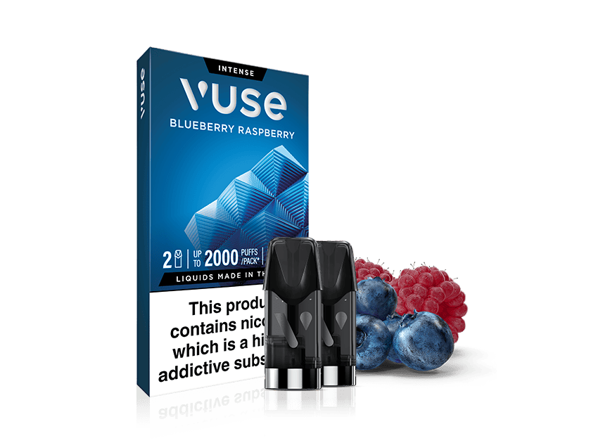 A Vuse Blueberry Raspberry vape pod pack is shown with two vape pods in front of the box. Blueberries and raspberries are placed beside the pods. The packaging includes a nicotine warning label.