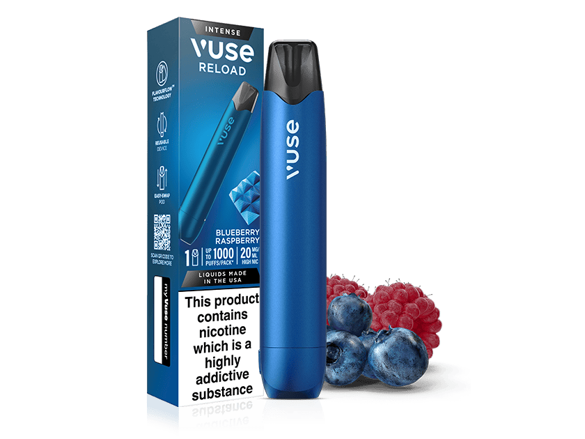 A Vuse Blueberry Raspberry Vuse Reload Pen and its packaging are displayed next to fresh blueberries and raspberries. The box shows the “Blueberry Raspberry” flavor and a nicotine warning label.