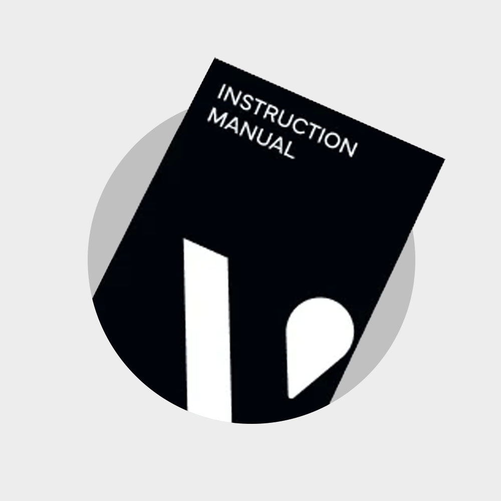 A black instruction manual with white text is positioned diagonally over a light gray circular background. The cover features the words INSTRUCTION MANUAL and simple white geometric shapes.