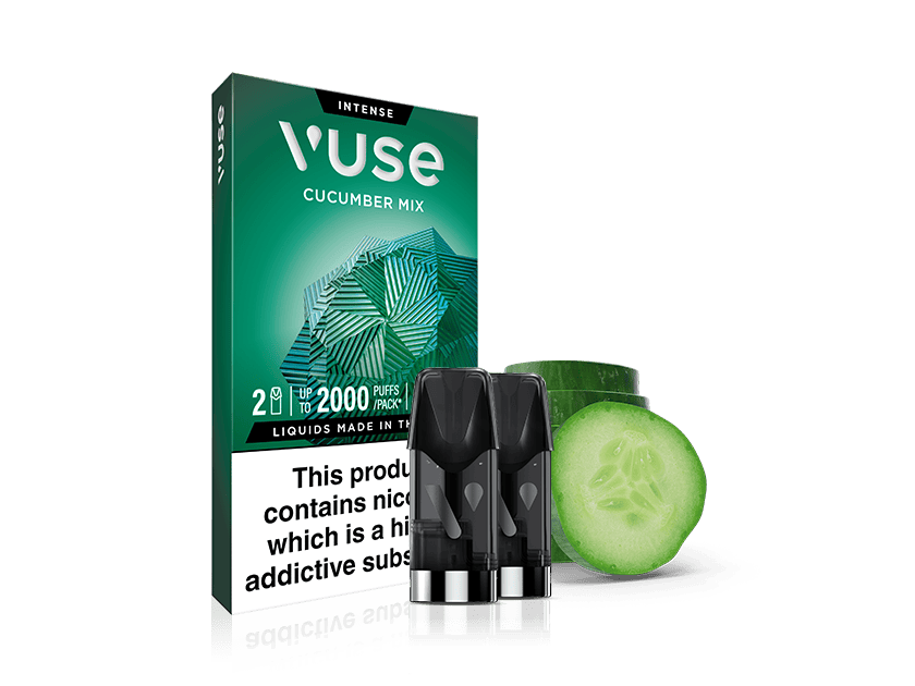 A box of Vuse Intense Cucumber Mix vape pods stands next to three black pods and a sliced cucumber, with a nicotine warning label on the packaging.