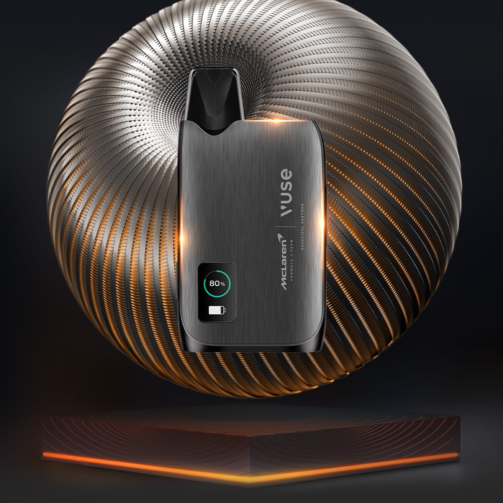 A metallic Vuse Ultra Device Kit McLaren with 80% battery and Bluetooth floats before a glowing, spiral-patterned backdrop, above an illuminated platform.