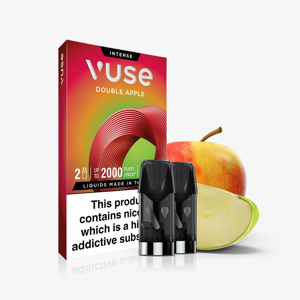 A box of Double Apple Vuse Extra Intense Flavour Pods by Vuse is shown with two black pods, a whole red-yellow apple, and a sliced wedge. The packaging displays a nicotine addiction warning and promotes smooth nic salts for rich taste.
