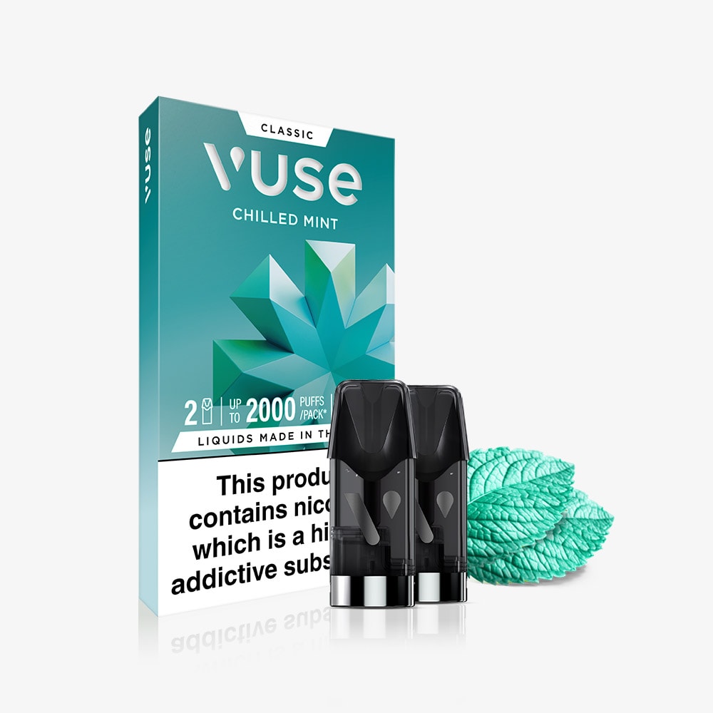 A Vuse Chilled Mint Classic Flavour Pods pack is shown with two pods and mint leaves in front. The Vuse box highlights nic salts content, flavor, and a health warning.