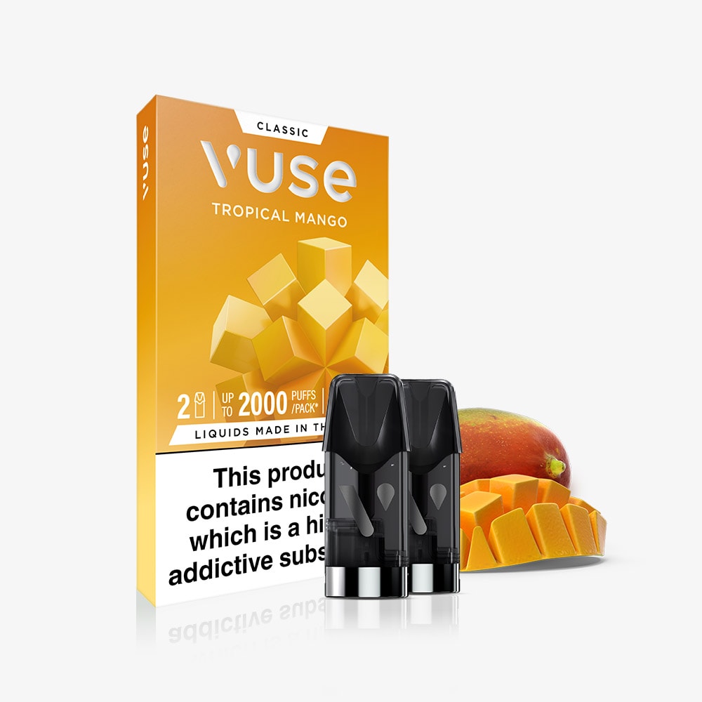 A pack of Tropical Mango Vuse Classic Flavour Pods is shown with two pre-filled Vuse Pods in front and a sliced mango next to the box. The orange packaging displays mango cubes and a nicotine warning label.