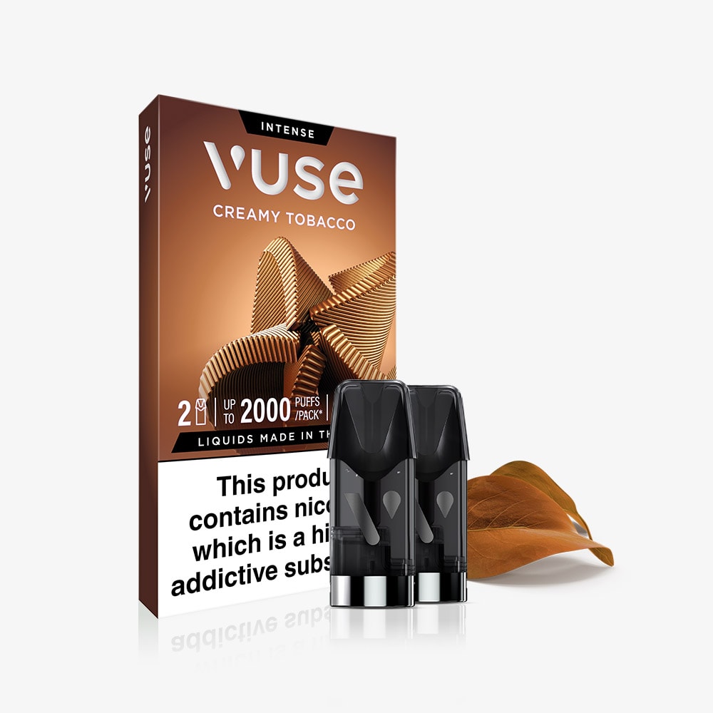 A box of Vuse Creamy Tobacco Extra Intense Flavour Pods with two vape pods, a tobacco leaf design, and nicotine warning label. Experience smooth tobacco and vanilla flavours. Compatible with Vuse PRO devices.