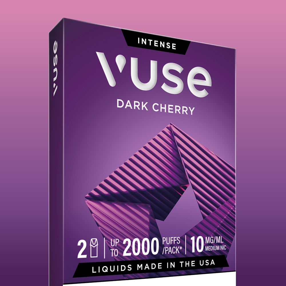 A purple box of Dark Cherry Vuse Extra Intense Flavour Pods with geometric designs, labeled 2 Vuse Pods, up to 2000 puffs/pack, 10 mg/ml pre-filled e-liquid, and "Liquids made in the USA" on a pink-purple gradient background.