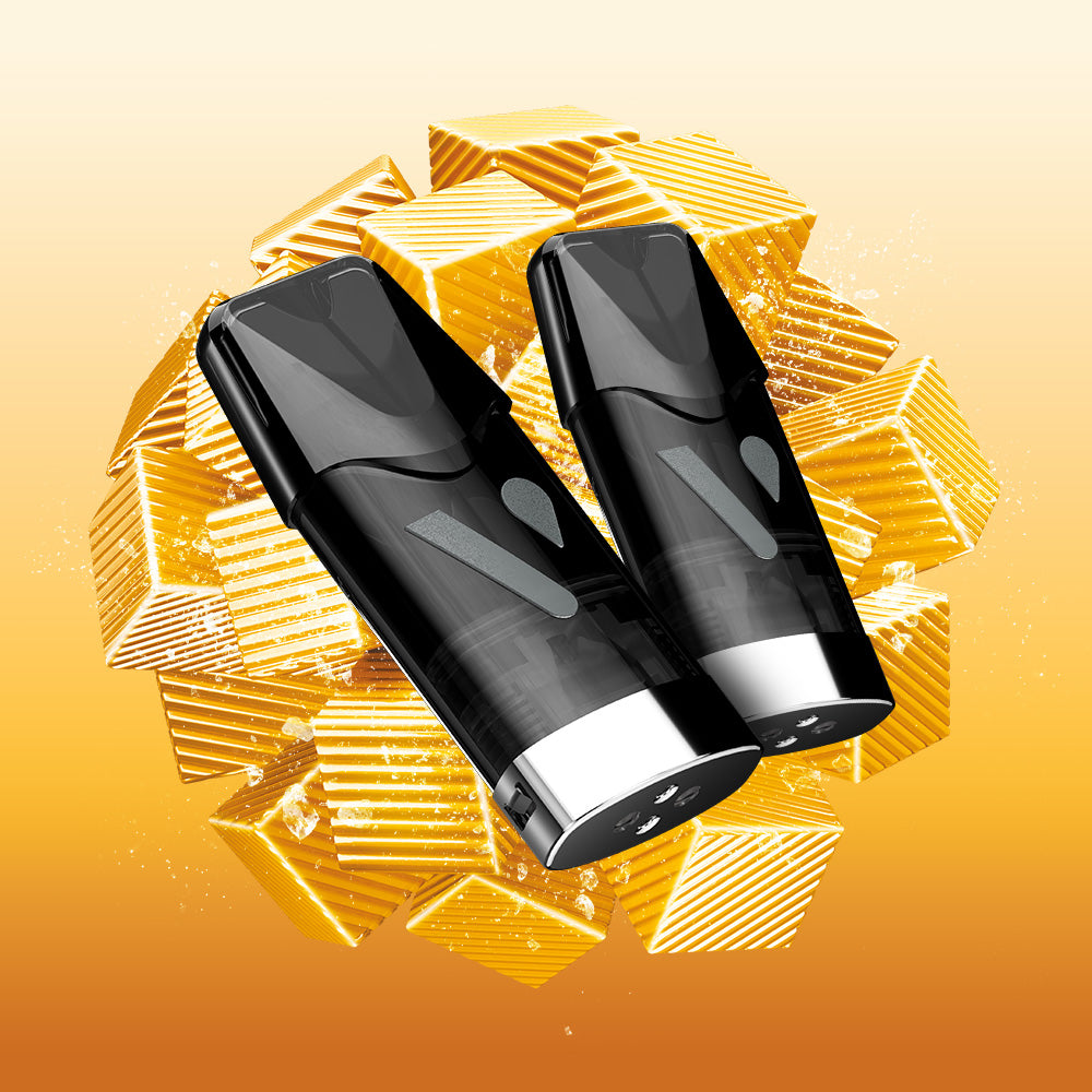 Two sleek black Mango Ice Vuse Extra Intense Flavour Pods are angled in front of stacked golden chocolate squares on an orange gradient background, highlighting their compatibility with Vuse PRO devices.