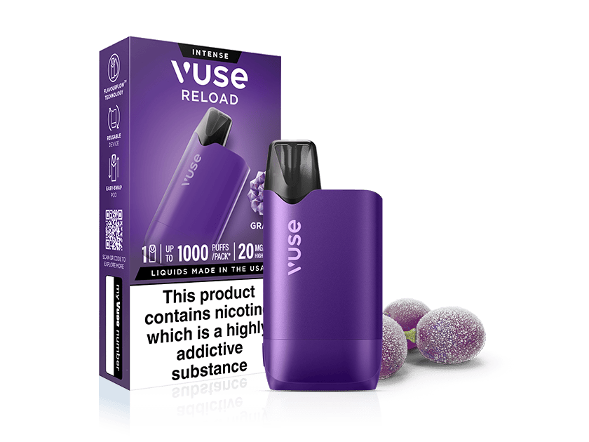A purple Vuse Reload vape device stands in front of its matching packaging, which displays product details and grape illustrations. Three frosted grapes lie next to the device, reinforcing the grape flavor theme.