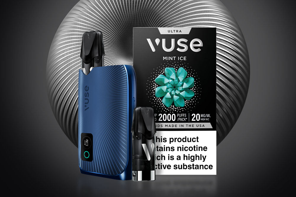 A blue Vuse vape device, two vape pods, and a Vuse Mint Ice flavor box are displayed in front of a metallic, circular background. A warning label at the bottom states the product contains nicotine.