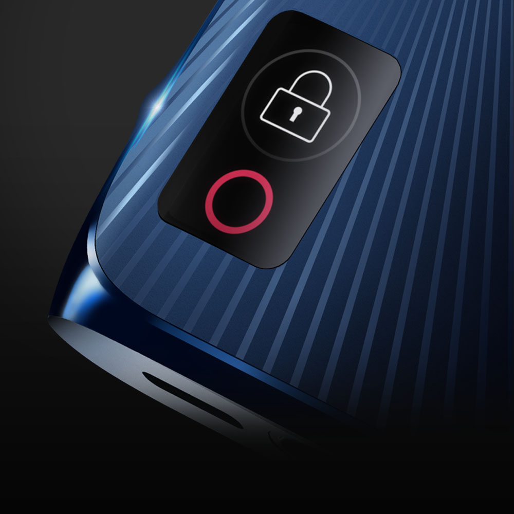 Close-up of a blue device with a textured surface, displaying a screen featuring a white padlock icon and a red ring below it, suggesting a security or lock feature.