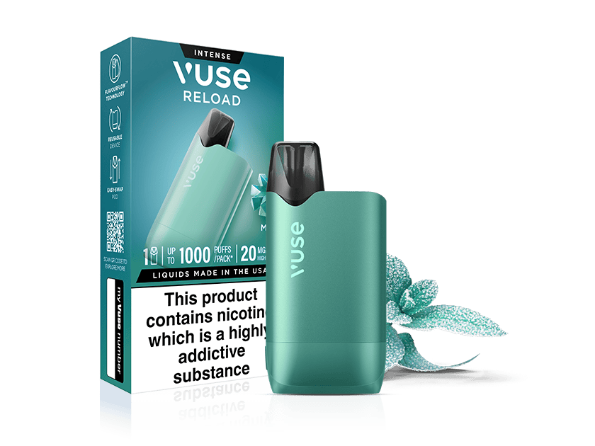 A teal Vuse Reload vape device stands in front of its matching product box, which displays information about nicotine content. Mint leaves are placed beside the device, emphasizing a mint flavor.
