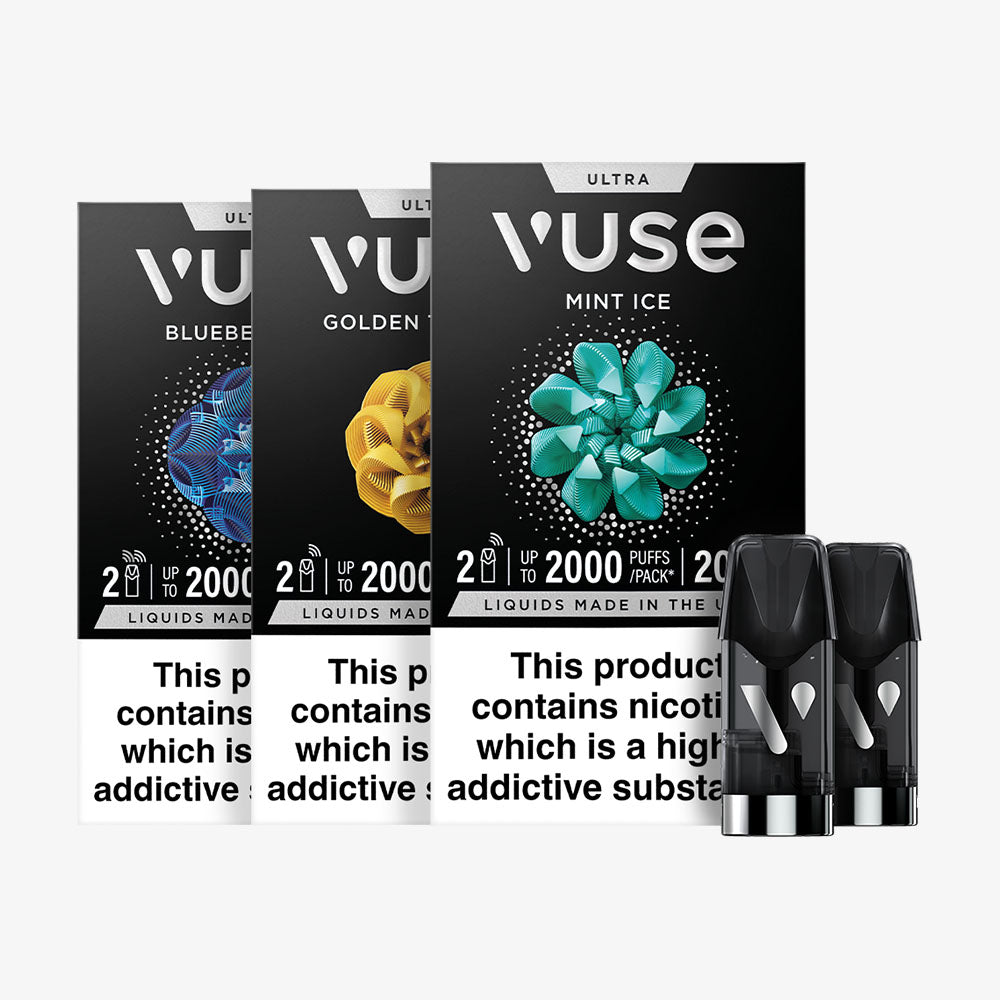 Three Vuse vape pod packs in Blueberry, Golden Tobacco, and Mint Ice flavors are arranged side by side, with two refill pods placed in front of the packs. Warning labels about nicotine are visible on the packaging.