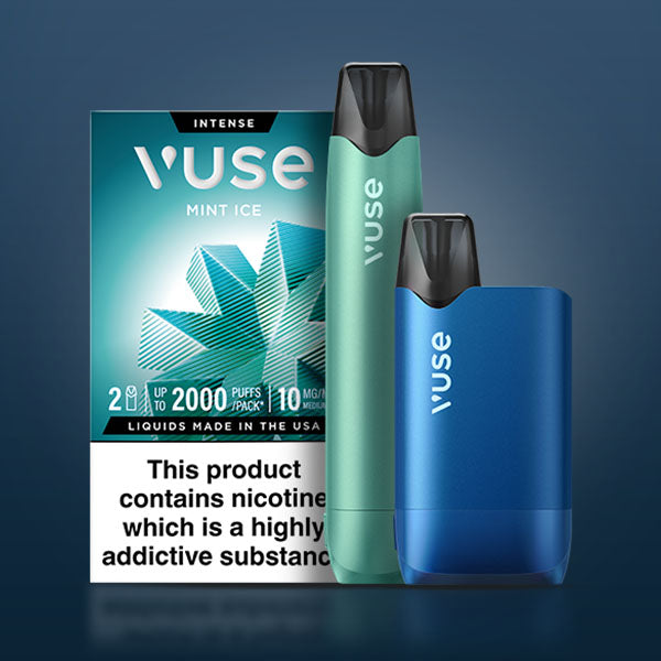 Two Vuse vape devices, one green and one blue, stand in front of a Vuse Mint Ice e-liquid pack with a teal leaf design. Packaging includes a nicotine addiction warning at the bottom.