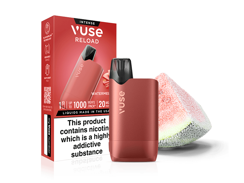 A Watermelon Ice Vuse Reload Box reusable vape device with premium packaging marked "Watermelon" sits next to a slice of watermelon candy. The box displays a bold nicotine warning at the bottom.